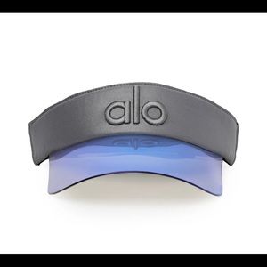 Alo yoga sun visor in silver and blue.